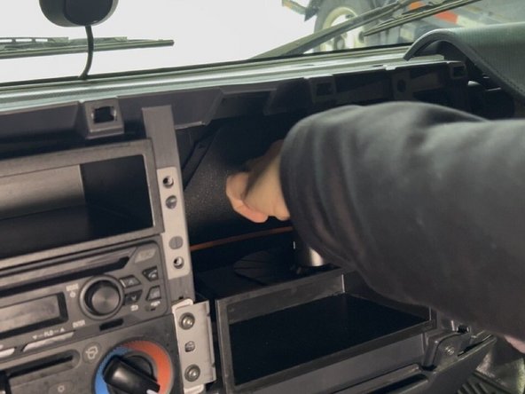 Route the monitor connector fom the vehicle fuse panel to the monitor mounting location.