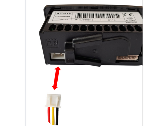 Unplug the in-cab controller from its original vehicle-connected harness.