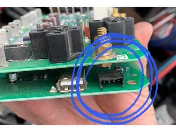 Connect harness HRN-CCLADU5 to the controller board’s data connector by routing it to the cold chain unit compartment.