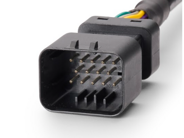 Plug the male 14-pin connector of the HRN-RCCCAAPX into the refrigeration unit's harness. Please note that the connector may vary slightly in appearance based on your specific harness version, as shown in the images below.