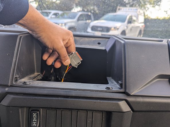 Route the wires towards the chosen power interface point. Make sure you secure the wires using cable ties and clamps as needed to prevent interference with operating the asset.
