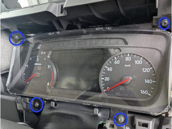 Remove the 4 screws that hold in the instrument cluster.