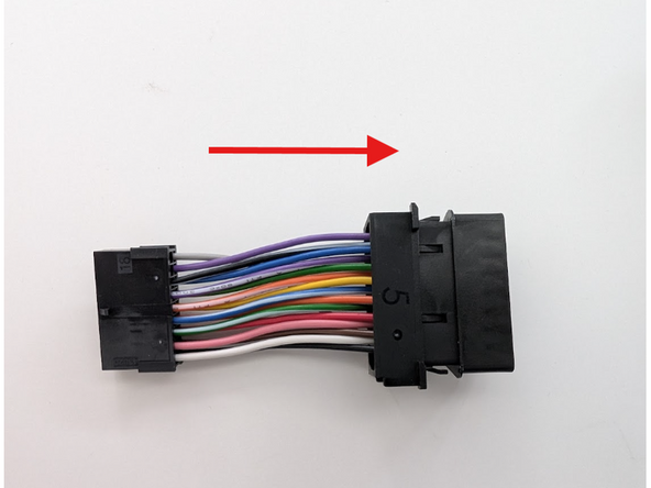 Select ADAPTOR 5  from the pack, and slide it onto the short harness section, clipping it into place as shown