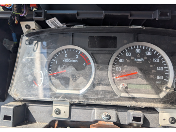 Reinstall the instrument cluster and tighten screws to secure it.