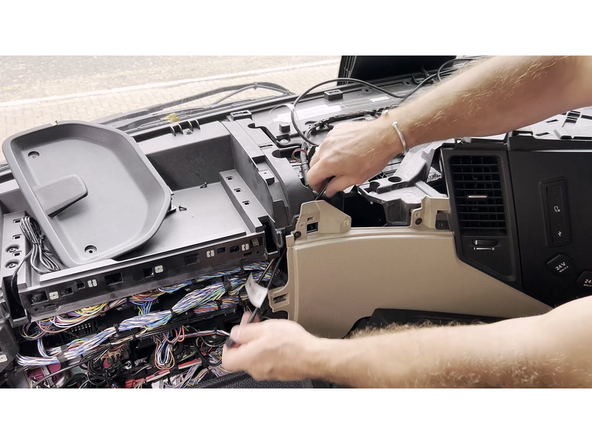 Continue routing the tachograph harness over to the diagnostic port location.