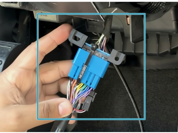 Plug the vehicle OBD-port into the harness, and secure them with a cable tie.