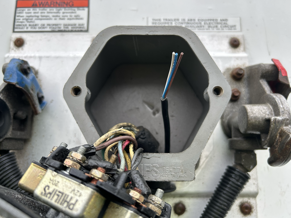 In some cases you may need to drill a hole to access the trailers connection point.