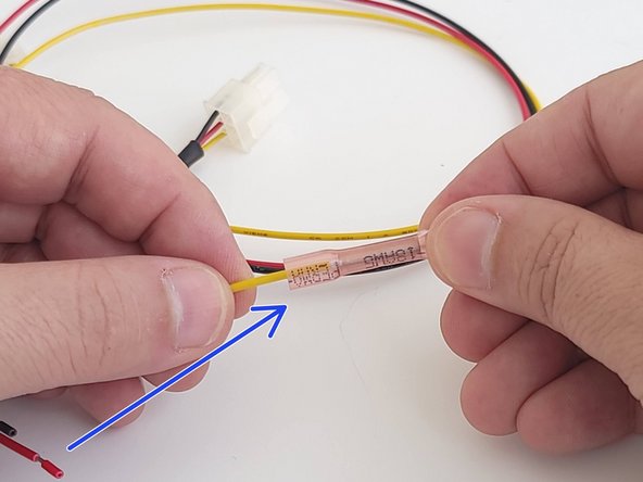 Using your wire crimpers, attach the fuse holders on to the Red and Yellow wires using the included parts.