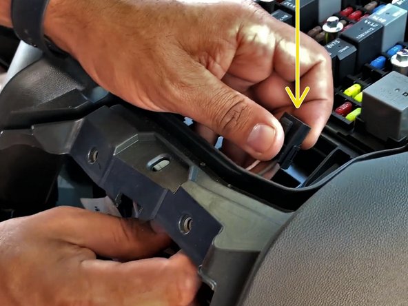 Reroute this harness up towards the fuse box area.