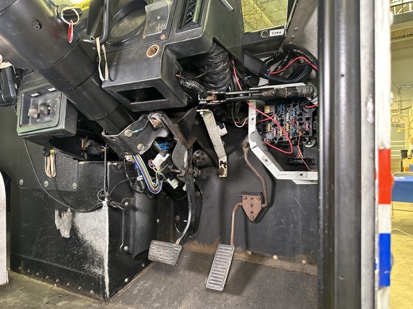 Locate  the ECM connection point on the driver side of the vehicle.