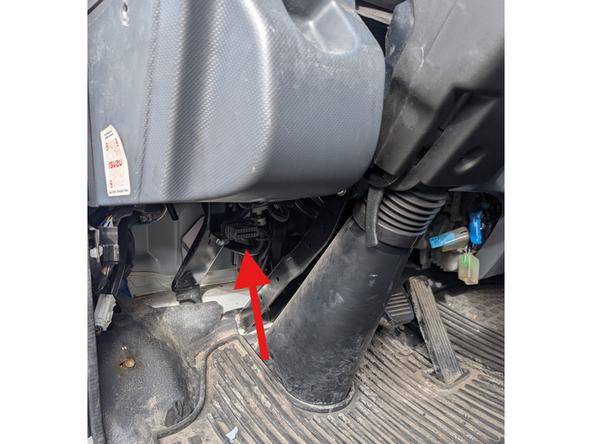 Locate OBD port on the drivers side in the left foot well