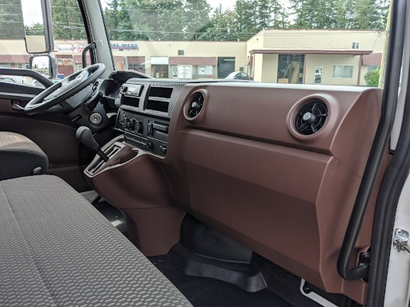 Remove the lower passenger-side dash panel. It is held in place by clips only.