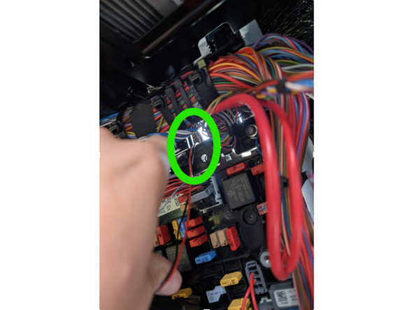 Route the wires from the fuse area outside to the Bodybuilder interface, which is located in the engine bay.