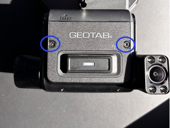 Using the provided hex key, loosen both dashcam locking screws to prepare the dashcam for adjustment.