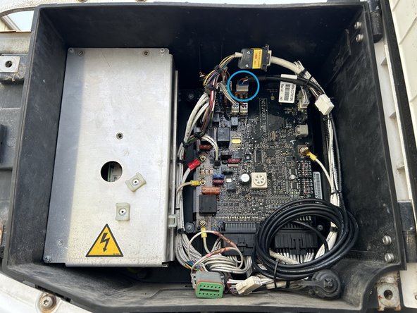 Connect the refrigeration unit harness to the connection point for the refrigeration unit controller.