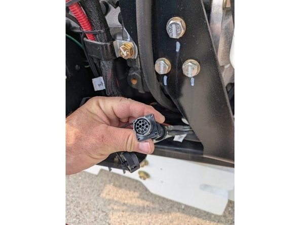 Locate the 12 pin diagnostics connector and plug in HRN-RL12K2.