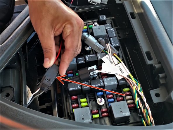Connect the provided black  2-pin adapter to the vehicle side 2-pin power connector that was rerouted.