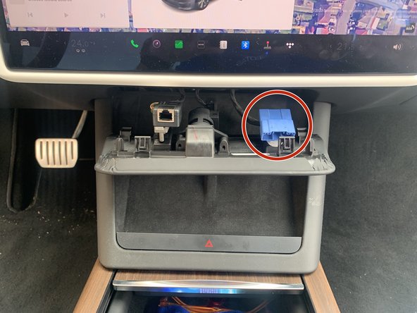 The diagnostic connector will be visible behind the trim panel.