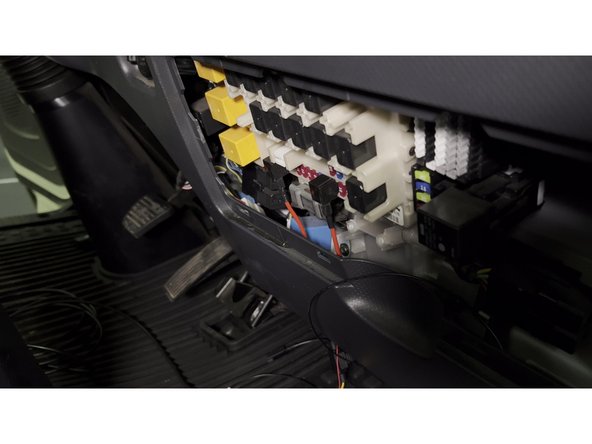 Route the harness cable from behind the headliner down to the fusebox.