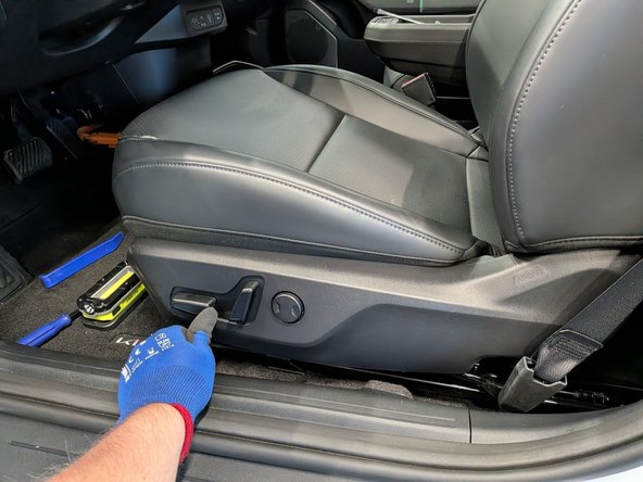Slide the front seats as far forward as possible and adjust them to their highest position. This will assist with console removal in a later step.