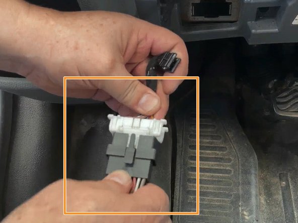 Plug the supplied Geotab T-harness into the vehicle OBDII connector