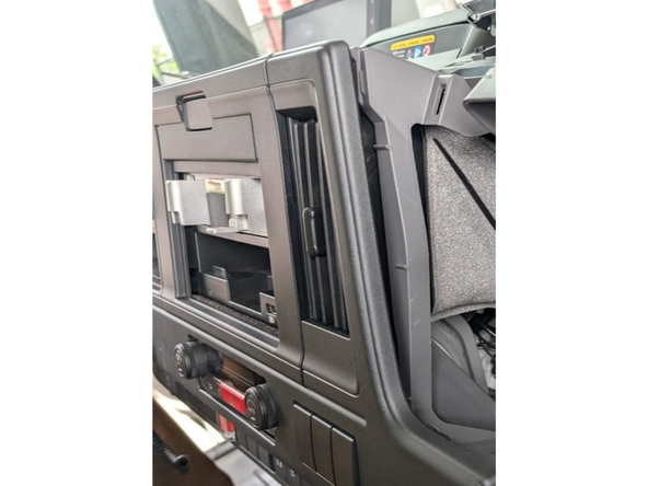 With the center display removed, use the panel removal tool to partially remove the right hand side of the main dash panel to make the Instrument Cluster shroud accessible