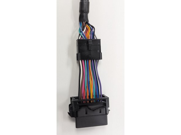 Clip the short section into place on the main harness.