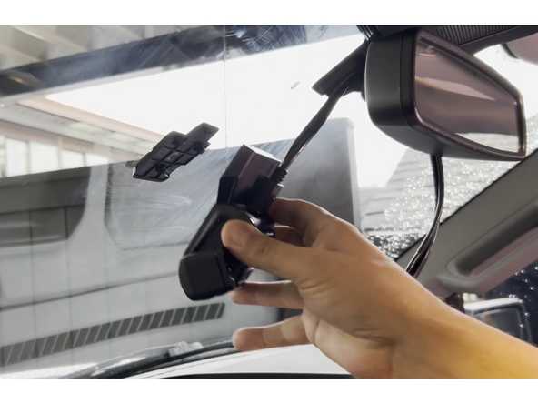 Dismount the camera from the mounting bracket.