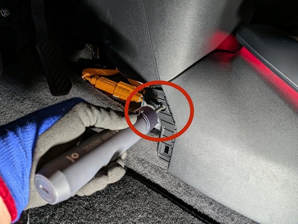 Unscrew the center console on both sides.