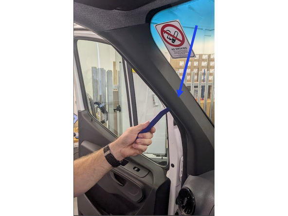 Remove the plastic panel from the A-Pillar .