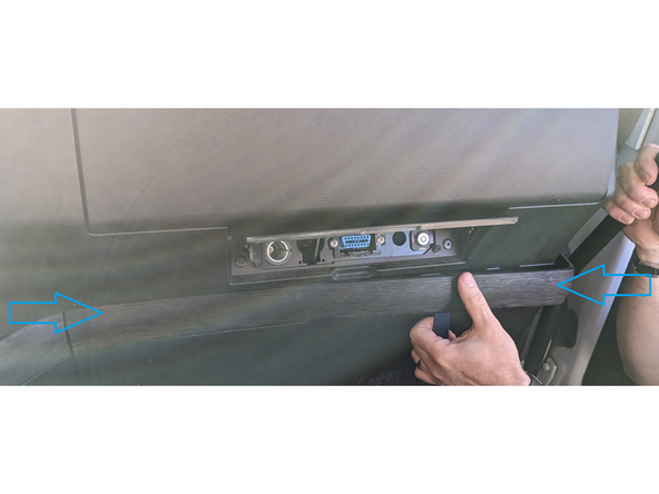 Remove the cover in order to access the screws behind.