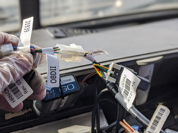 Connect the 6-pin white Molex connector on the HRN-CK10A2 harness (labeled OBDII) to the 6-pin white Molex connector on the HRN-CM24Y1 harness (labeled OBDII).