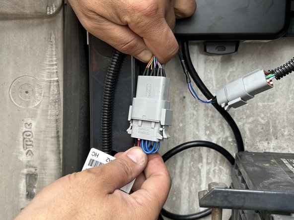 Connect the HRN-RW03K4 harness to the GO RUGGED.