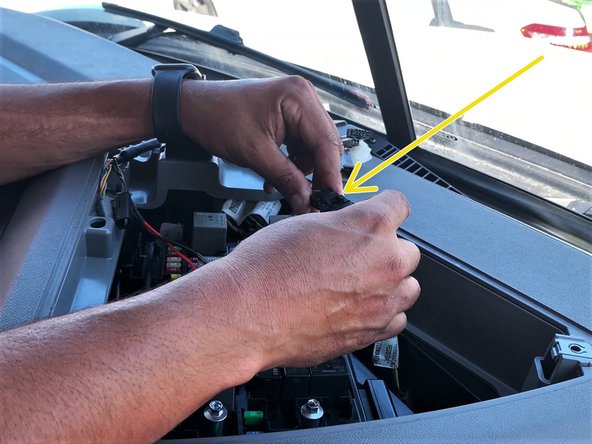 Connect the provided black 2-pin adapter to the vehicle side 2-pin power connector labeled BATT OPT.