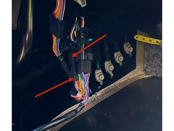 Plug the harness into the original plug from the vehicle, secure it with a cable tie, and then trim any excess tie.