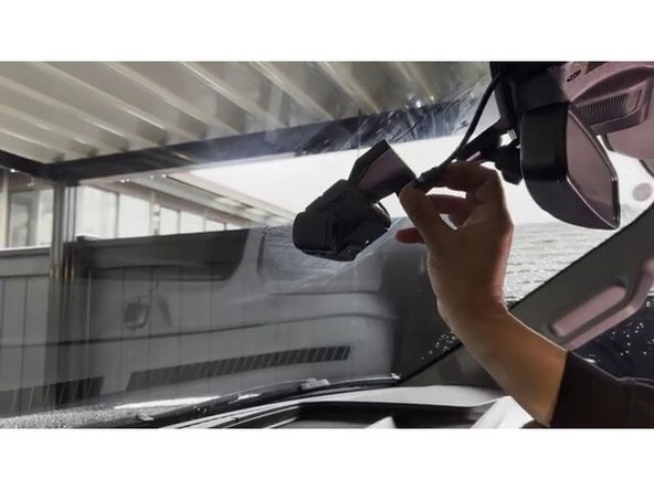 Replace the cable cover on the GO Focus Plus and tighten the screw to secure both cables in place.