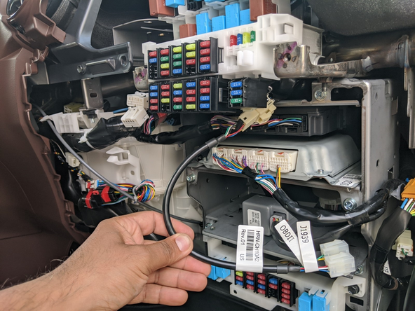 Plug the HRN-CH10A2 into the factory 10-pin GPS connector.