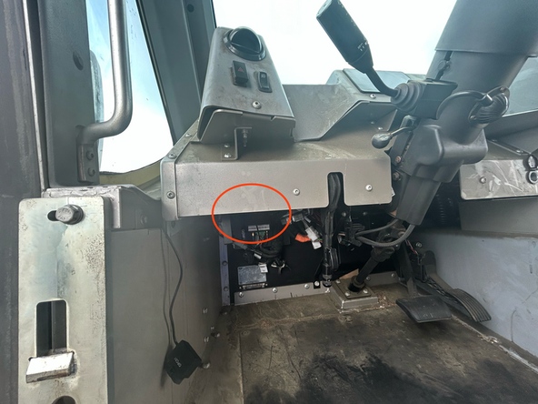 Locate and remove the OBD2 port from under the dash just to the left of the steering wheel.
