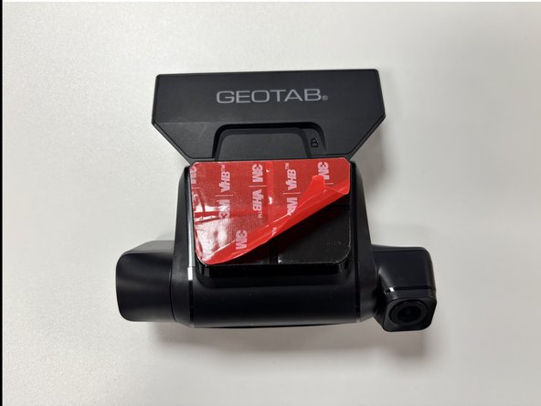 Once the installation area is clean and dry, remove the film from the adhesive and position the Go Focus Plus .