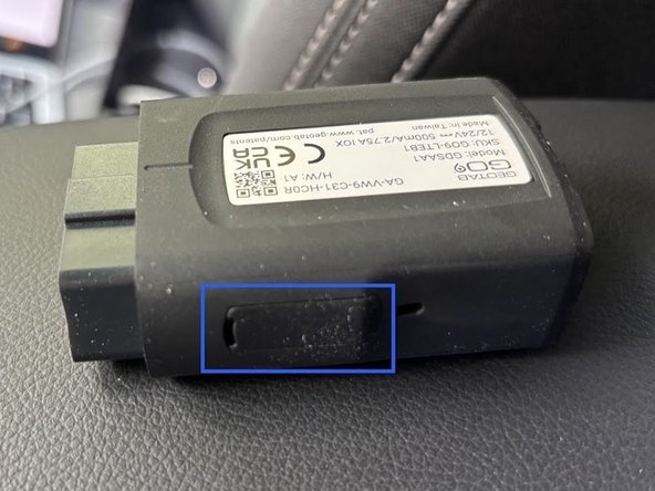 Remove the IOX expansion port cover on the GO device.