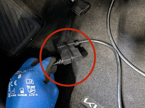 Plug the vehicle OBD port into the harness and secure the connection with a cable tie.