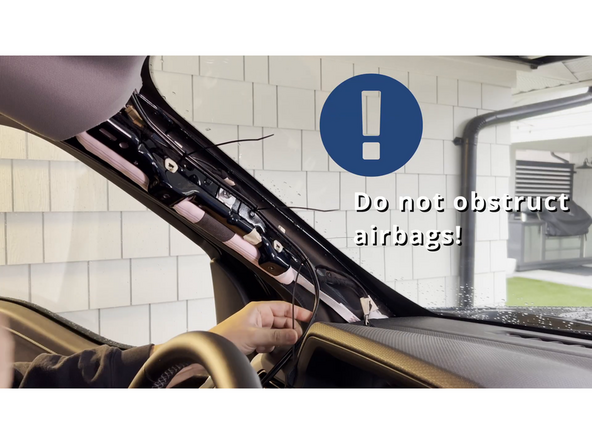 Secure the cable along the A-pillar in a way that it does not obstruct the airbag functionality.