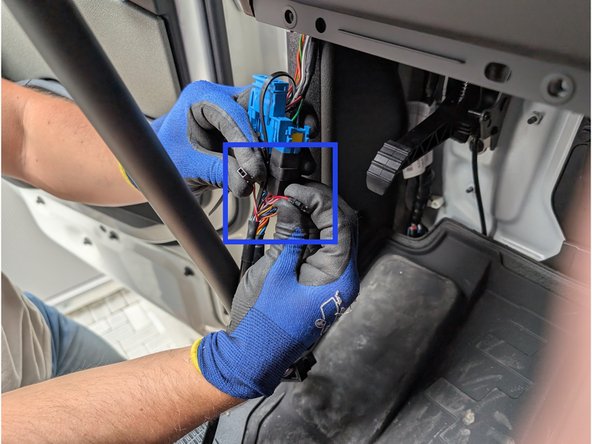 Clip the molex connectors of the T-Harness together and disconnect Pin 3 &amp; 11 as marked in blue.