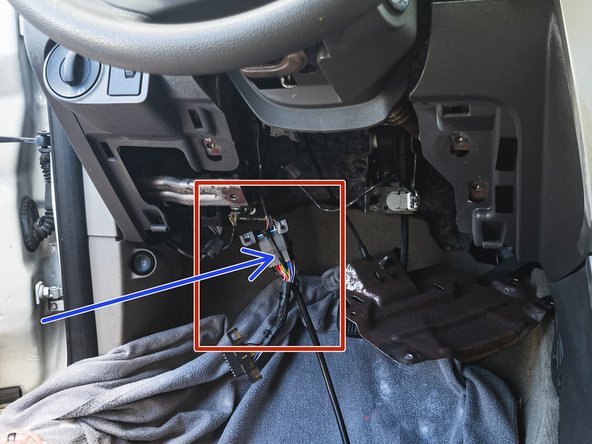 Plug the female connector from the T-harness into the OEM OBDII connector.
