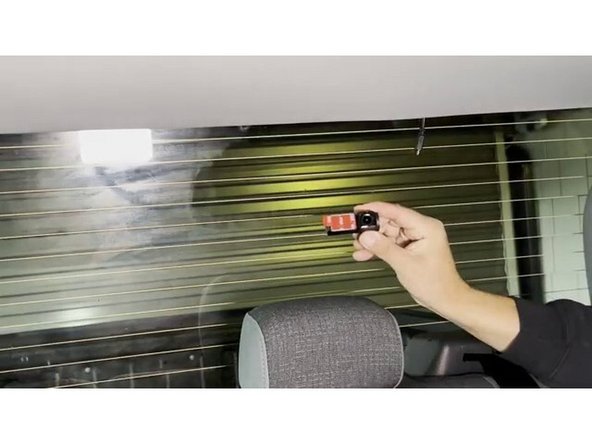 Confirm the alcohol on the rear window has fully evaporated before proceeding.