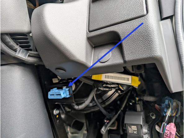 Locate the diagnostic port under the dash, to the right of the steering column.