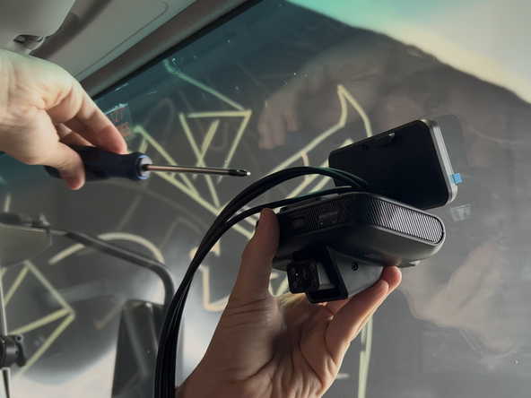 Pre-loosen the screws on the camera using the provided Allen key so you can adjust the camera angle.