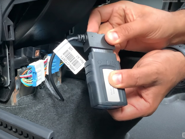 Plug the GO device into the Geotab harness.