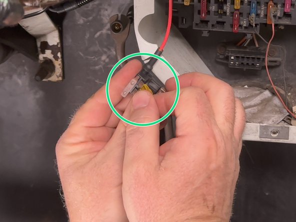 Place the removed HORN/LPS fuse into the add-a-circuit fuse tap.