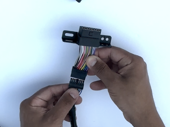 Connect the Molex connector to the T-harness, making sure the lock is clipped in to ensure a tight connection.